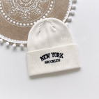 Шапочка демісезонна New York, молочна